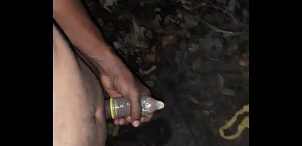  Sexy goan male boy masturbating in open place river side till he cum in condom